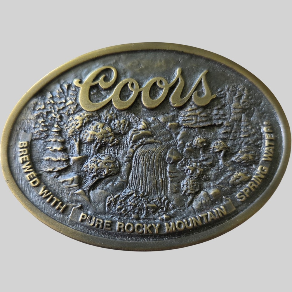 Vintage COORS BEER Rocky Mountain Waterfall Brass Belt Buckle Bottle Opener 3.5"
